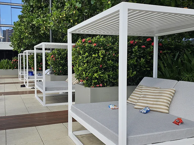 sitting bench along side of pool