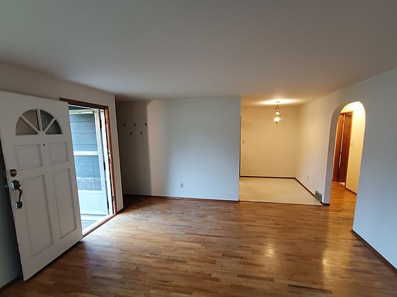 Looking from the living room to the kitchen and breakfast nook