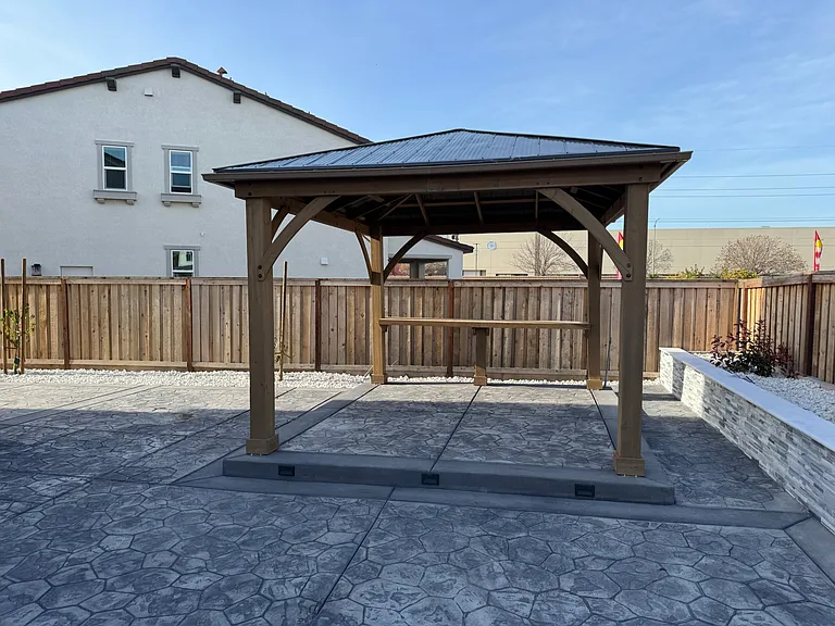Gazebo with lights and a bar table
