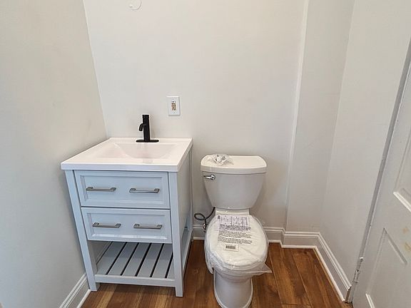 Bathroom sink and toilet. Mirror to come soon!