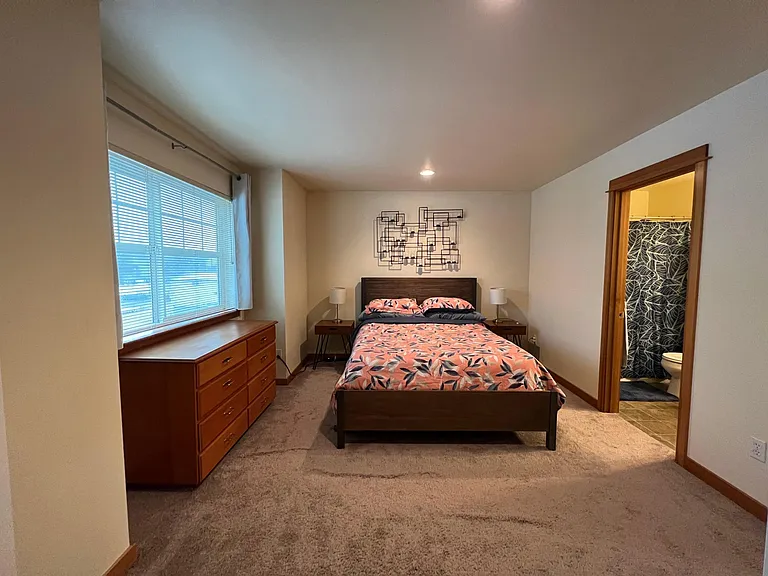 Two closets in the master bedroom with its own full bathroom