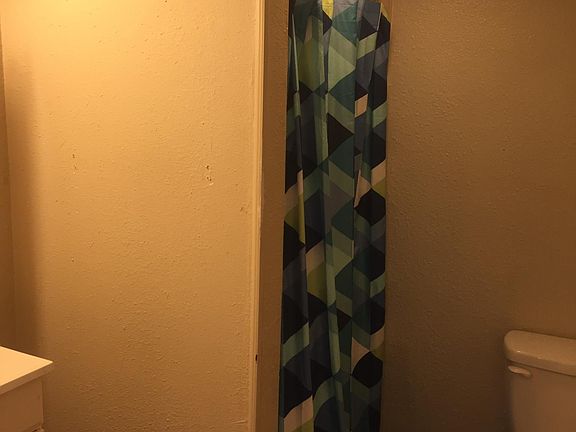 Bathroom with shower in studio