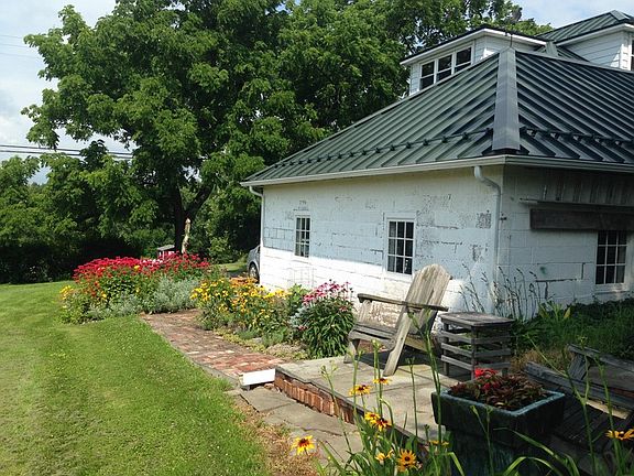 in front of garden facing front of property