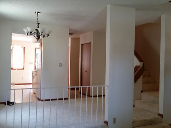 View from next to fireplace through first floor