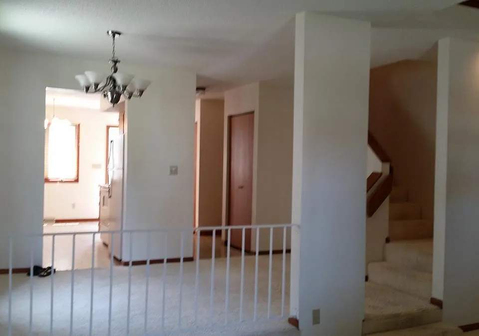 View from next to fireplace through first floor