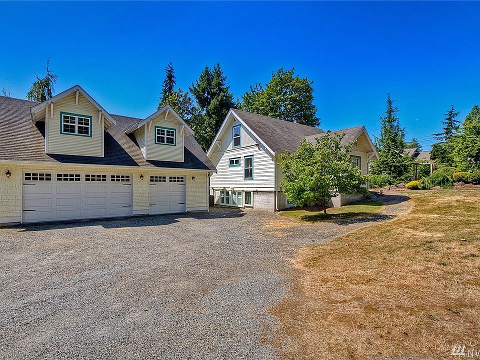 The 3 car garage has a large unfinished loft. It also has a workshop.