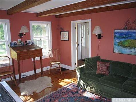 Living room view with wideboard floors