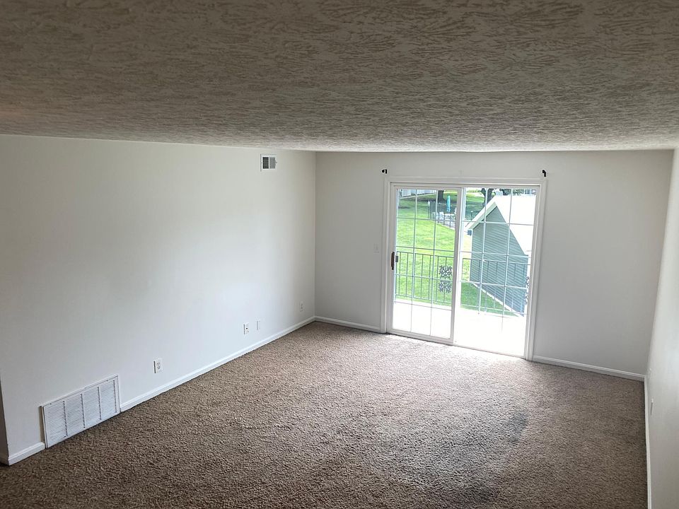 Family room with sliding doors to balcony