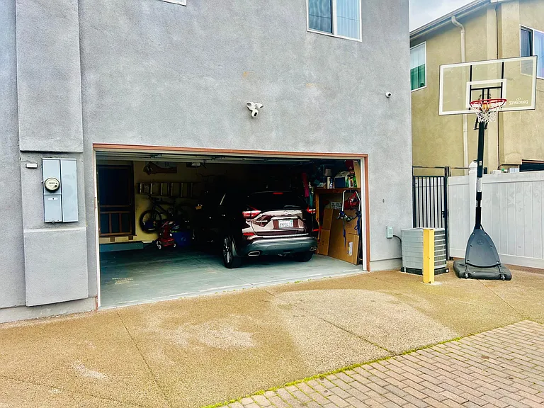 Garage entrance can fit 2 cars outside. Entrance/exit to Home via Garage access w/ Keychain size garage remote. Host as a 2021 Nissan Murano SUV available for an additional fee per day.