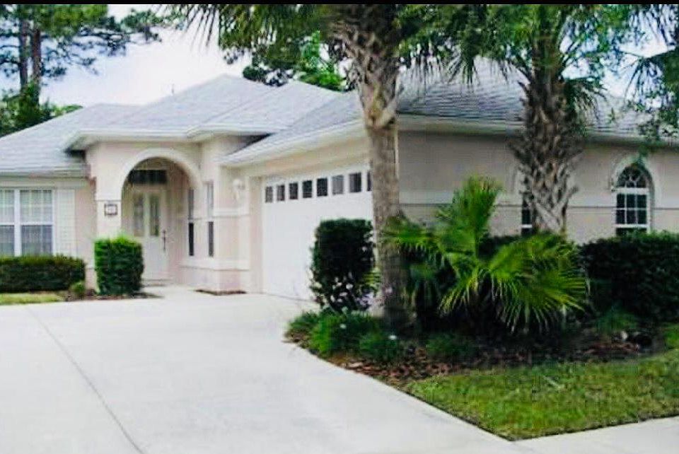 Street view of house and XL driveway