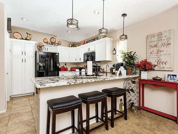 3rd image of 9855 W Melinda Ln