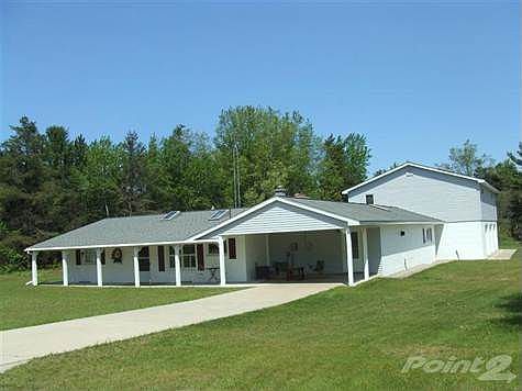 Front of House and 3 Car Garage
