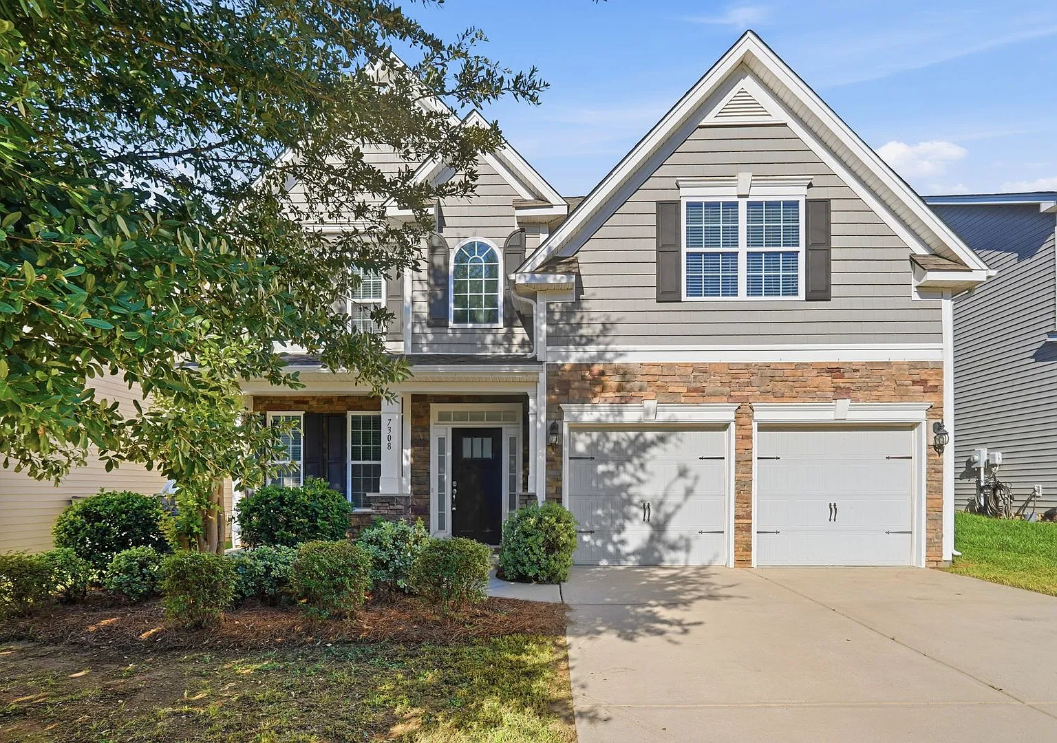 Spacious Two-Story Home with Main-Level Bedroom, Grand Foyer & Beautiful Finishes! — Photo 1