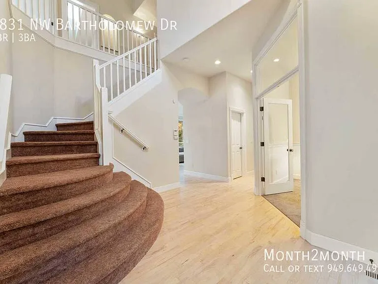 9831 NW Bartholomew Dr — Photo 30