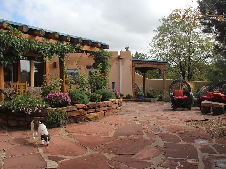 We do allow up to two well behaved pets. An additional acre is fenced and
many trails make area very dog friendly