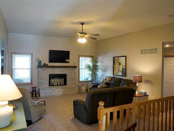 Fireplace in great room is currently wood burning, but can be converted to gas!