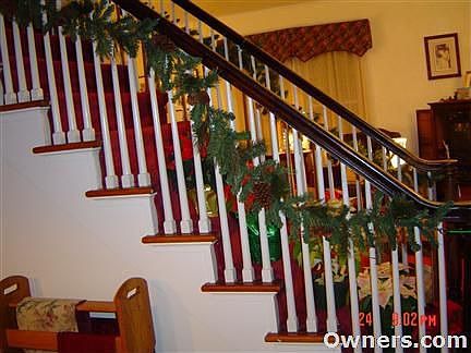 stairway between living rm and dining rm.