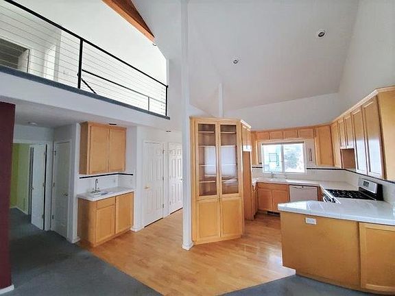 Kitchen is open to the great room and has a wet ba