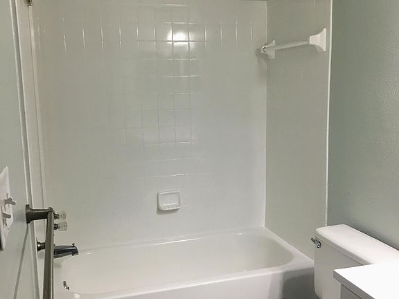 Renovated jack and jill bathroom that opens to both the bedroom and the living room