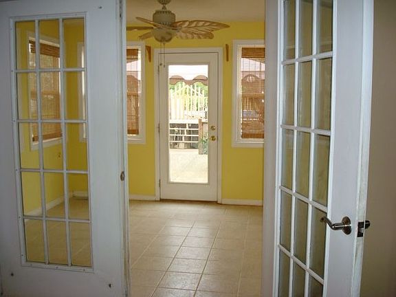 kitchen opens to sunroom