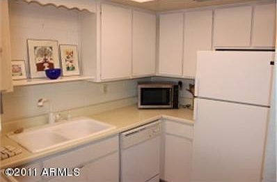 3rd image of 4848 N Woodmere Fairway APT 12