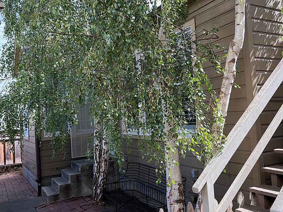Cottage with private gated front courtyard.