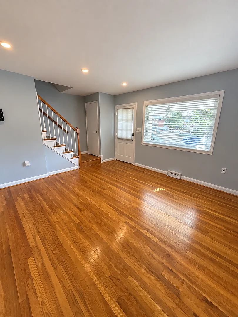 Charming 3-Bedroom Home with Hardwood Floors & Covered Parking — Photo 3
