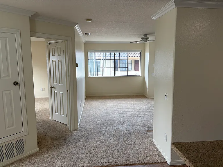 Living room and master bedroom as seen from the kitchen