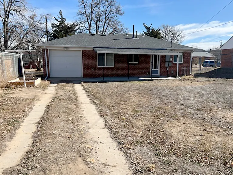 Backyard facing home