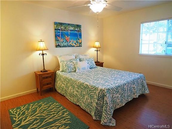 Master bedroom is bright and roomy.