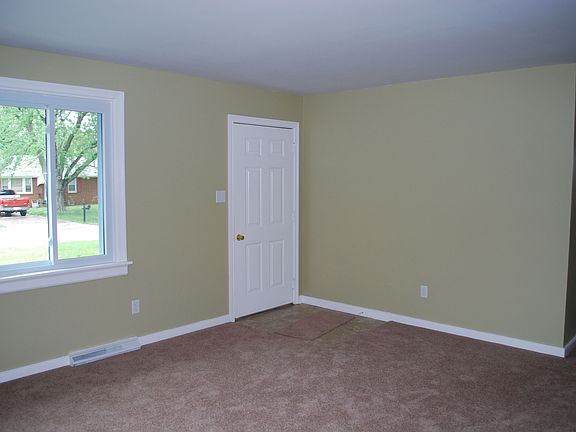 Living Room with new neutral carpeting.