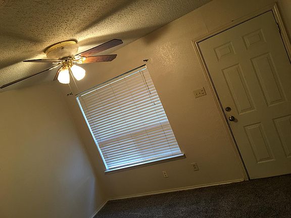 Dining room and back to door to CARPORT & outdoor sitting ar