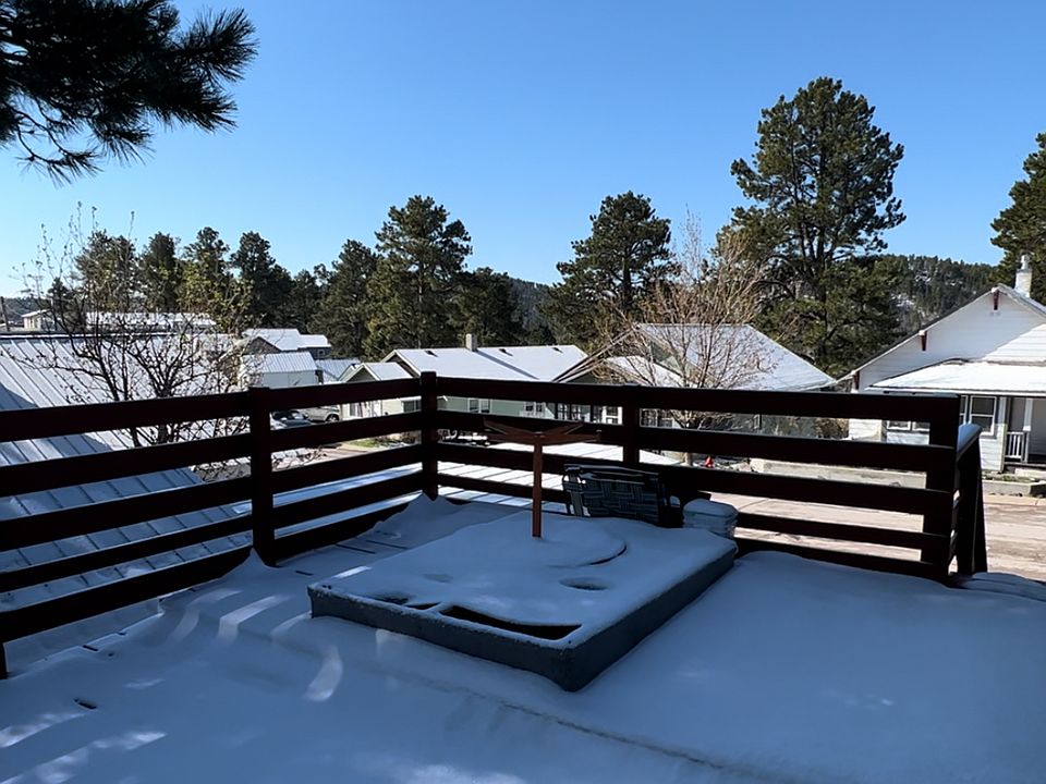 Nice sized deck over looking the street side.