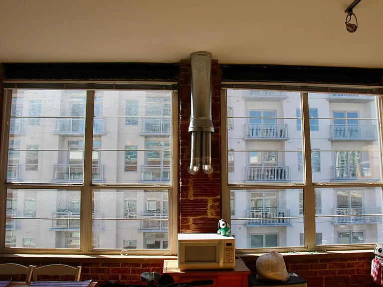 Windows Encased in Exposed Brick