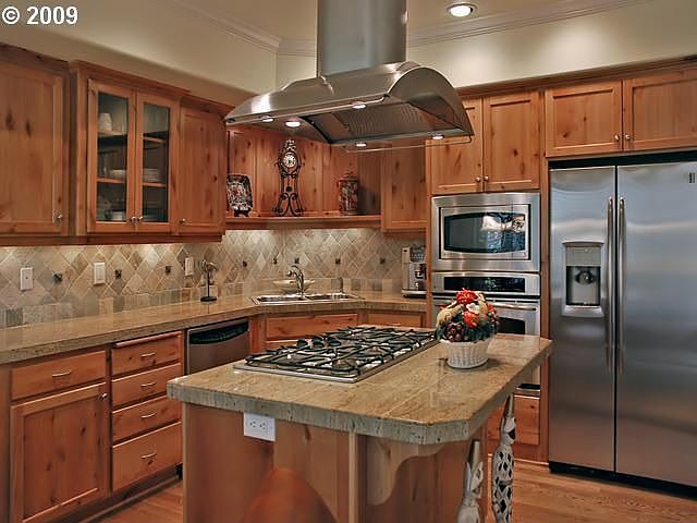 Cooks kitchen opens to living room 