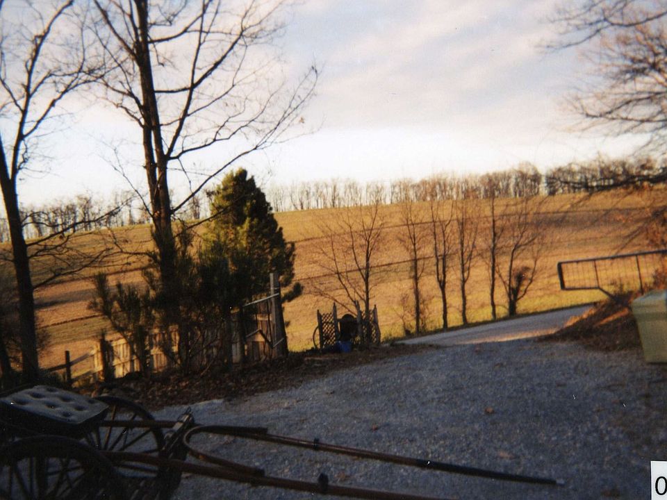 Gated entrance with circular driveway