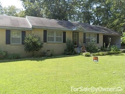 Front view of home
						:
						Beautiful plush grass front yard on quiet street of Vernon AL. Great neighbors