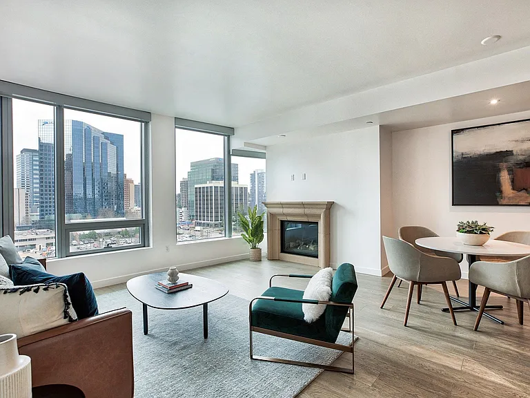 Natural gas fireplace with cast surround in select residences