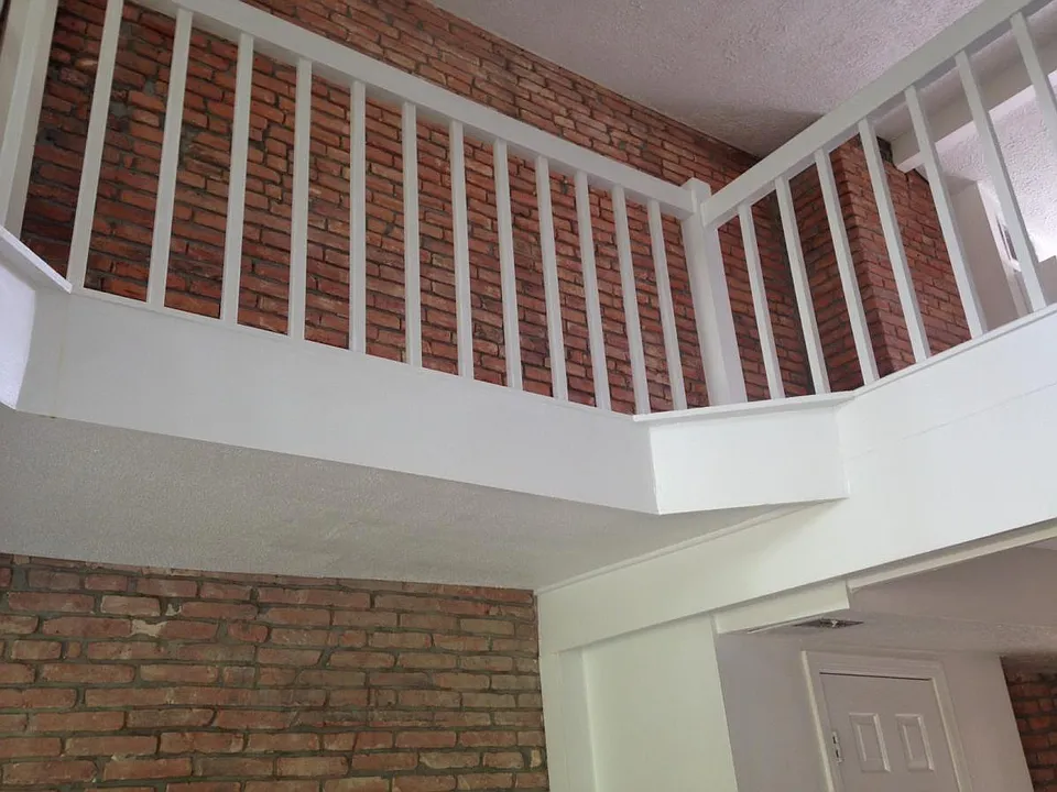 exposed brick on 1st and 2nd floors