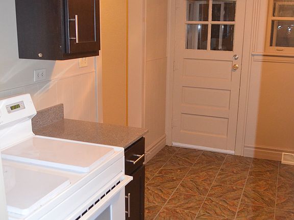 Refrigerator and range included.