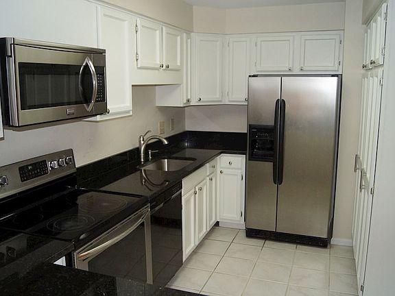 Updated kitchen with granite and stainless steel appliances
