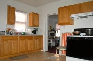 Nice cabinetry, tiled floor