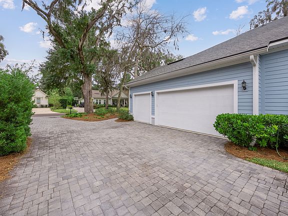 3 Car Oversized garage with space for golf cart