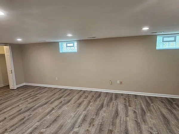 LOWER LEVEL FAMILY ROOM OR BEDROOM