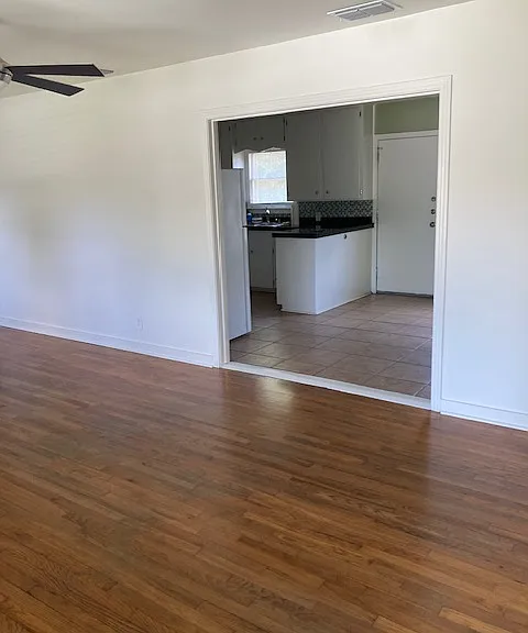 living room into dining and kitchen