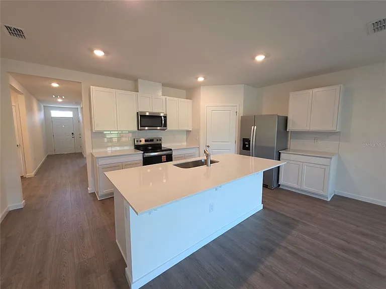 1009 Champion Ridge Dr — Photo 3
