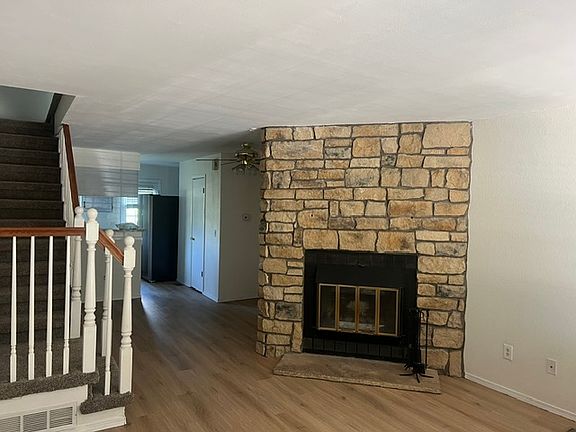 new flooring and paint with fireplace on main level