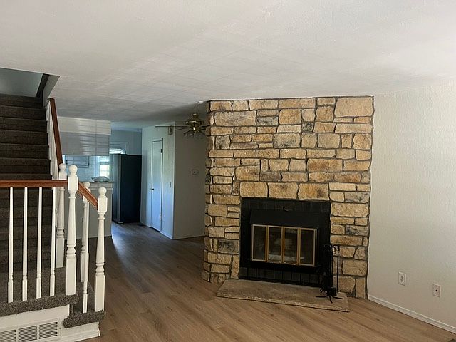 new flooring and paint with fireplace on main level