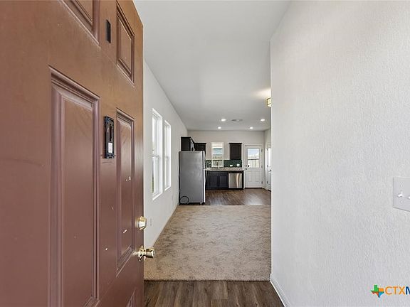 3rd image of 124 NE Peony Ln
