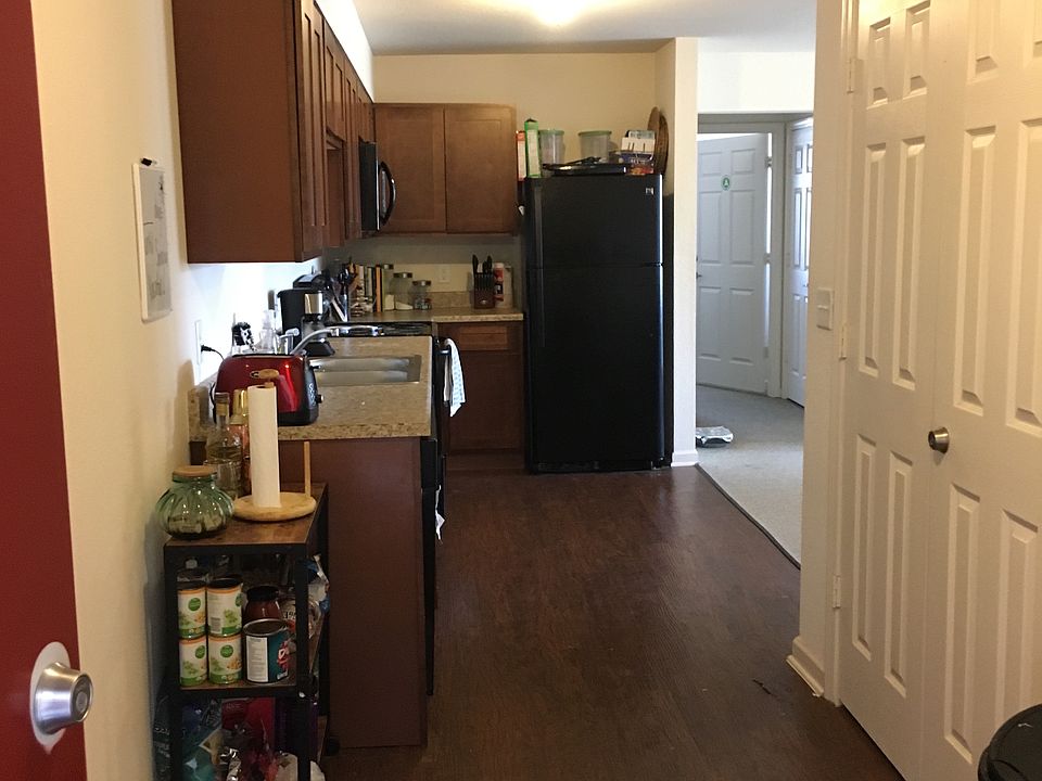 Entrance hallway leads into an open kitchen